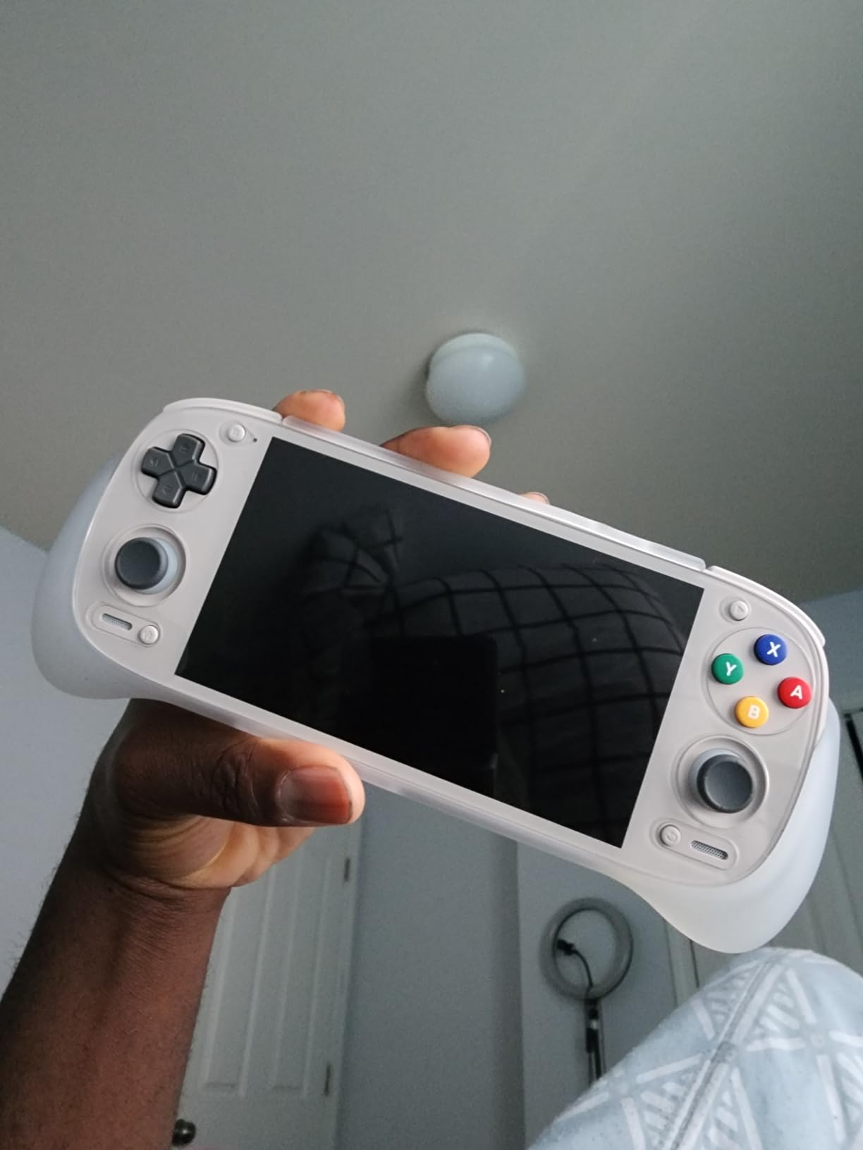 Retroid Pocket 5 Retro Handheld Game Console, 8+128G, 5.5-inch touchscreen 1080p Portable Android Gaming Handheld with Adreno 650 GPU & WiFi 6/BT5.1, Snapdragon 865 Processor, Android 13 (Black) customer photo 1