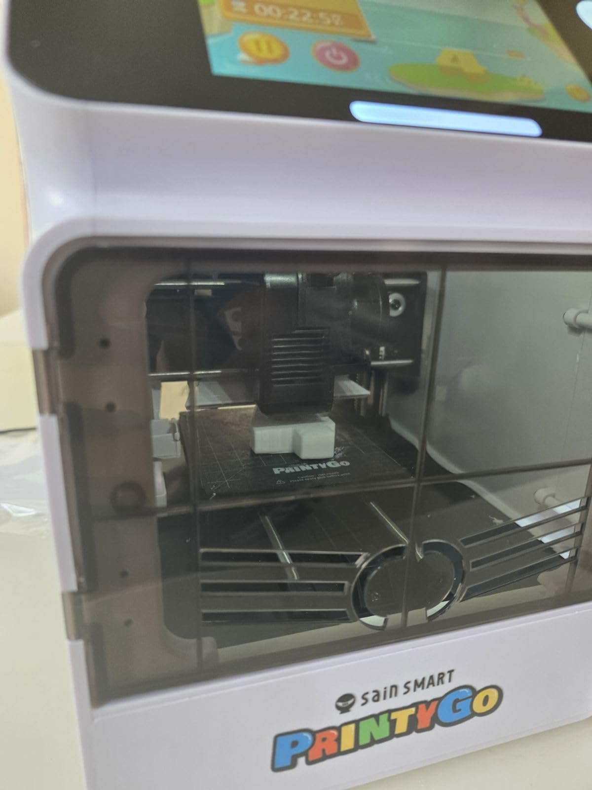 SainSmart PrintyGo Mini 3D Printer for Kids, 600mm/s Auto Leveling Printer for Beginners with 5-inch Touch Screen, 1500+ Models, Child-Safe Design, Wi-Fi/App Control, Pre-Assembled for STEM Learning Gift customer photo 1