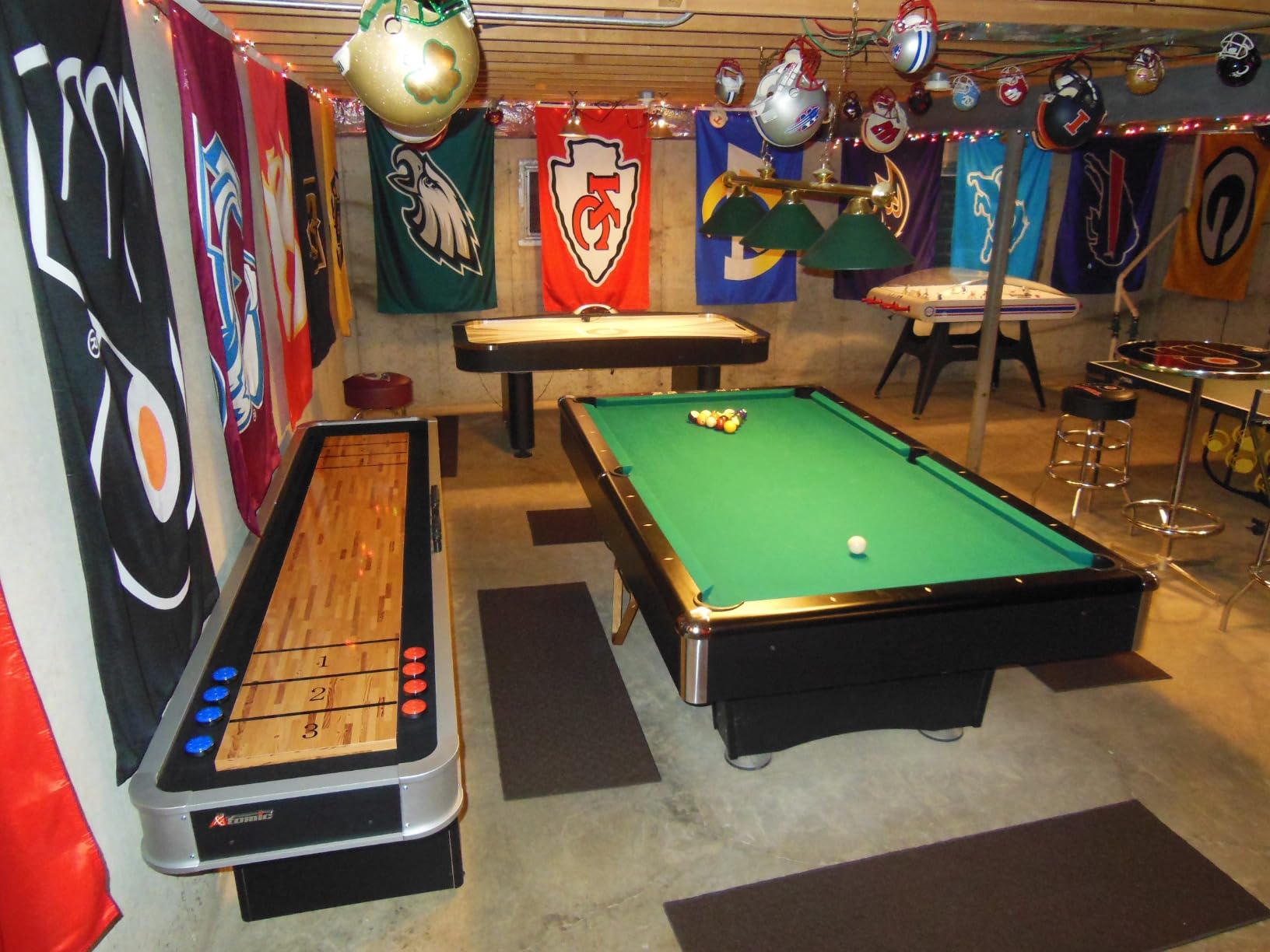 Atomic 9' LED Shuffleboard Tables with Poly-Coated Playing Surface for Smooth, Fast Puck Action and Pedestal Legs with Levelers for Optimum Stability and Level Play customer photo 1