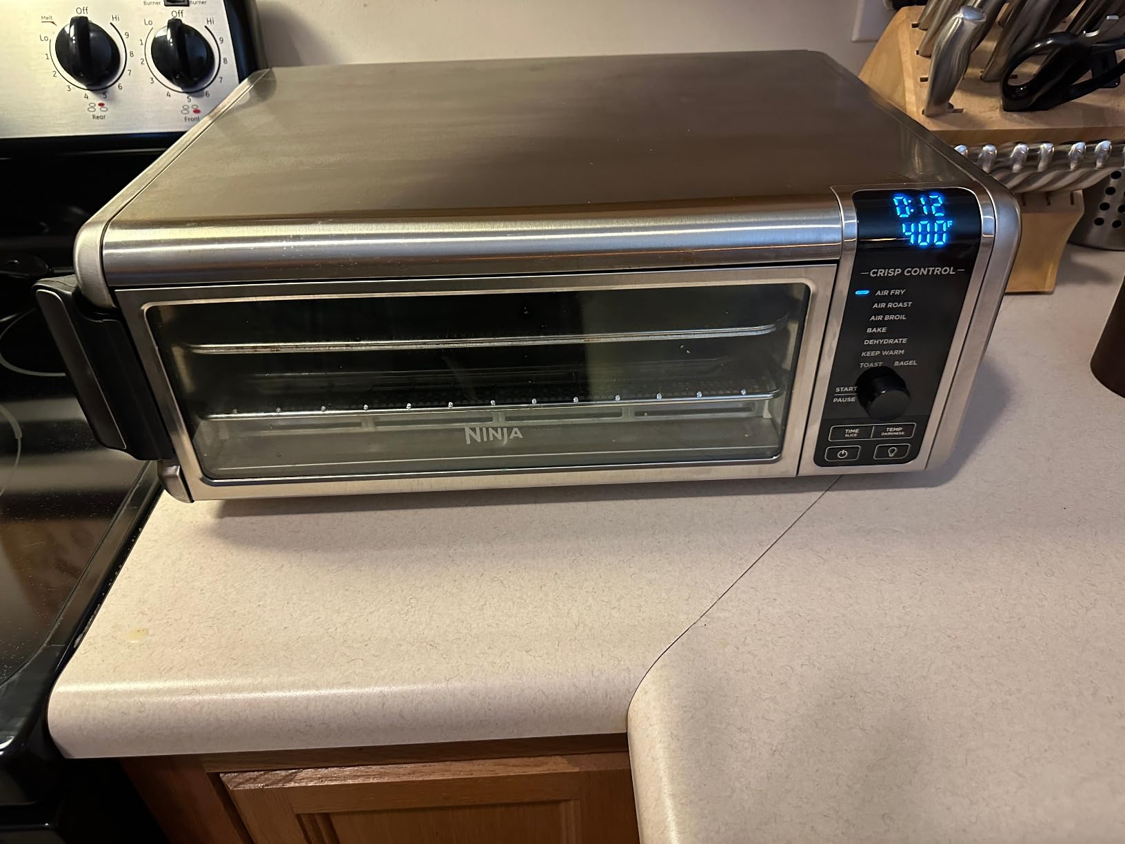 Ninja Flip Toaster Oven & Air Fryer, 8-in-1, Stainless Steel, SP151 | Air fry, bake, broil, toast, bagel, dehydrate, reheat, 1800W, Flip up & away, XL capacity customer photo 1