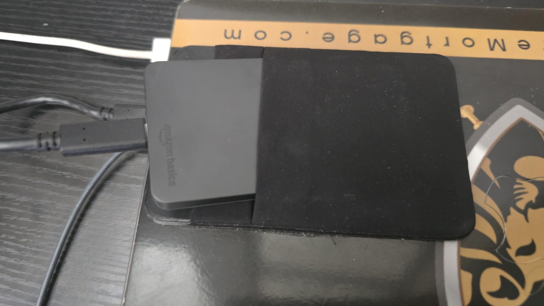 Amazon Basics Portable External SSD, 1TB, 2000MB/s Speeds, USB 3.2 Gen 2, IP65 Water & Dust Resistant, Black customer photo 2