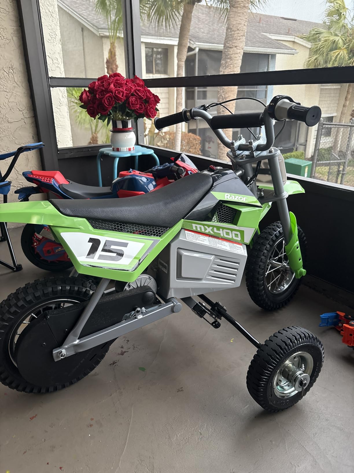 Razor MX400 Dirt Rocket Electric Bike for Kids Ages 8+, 140 Pounds Max Weight, Green – 24-Volt Battery, up to 14 Mph, 30-Minute High Speed Ride Time, Twist-Grip Throttle, 12-Inch Pneumatic Tires customer photo 2