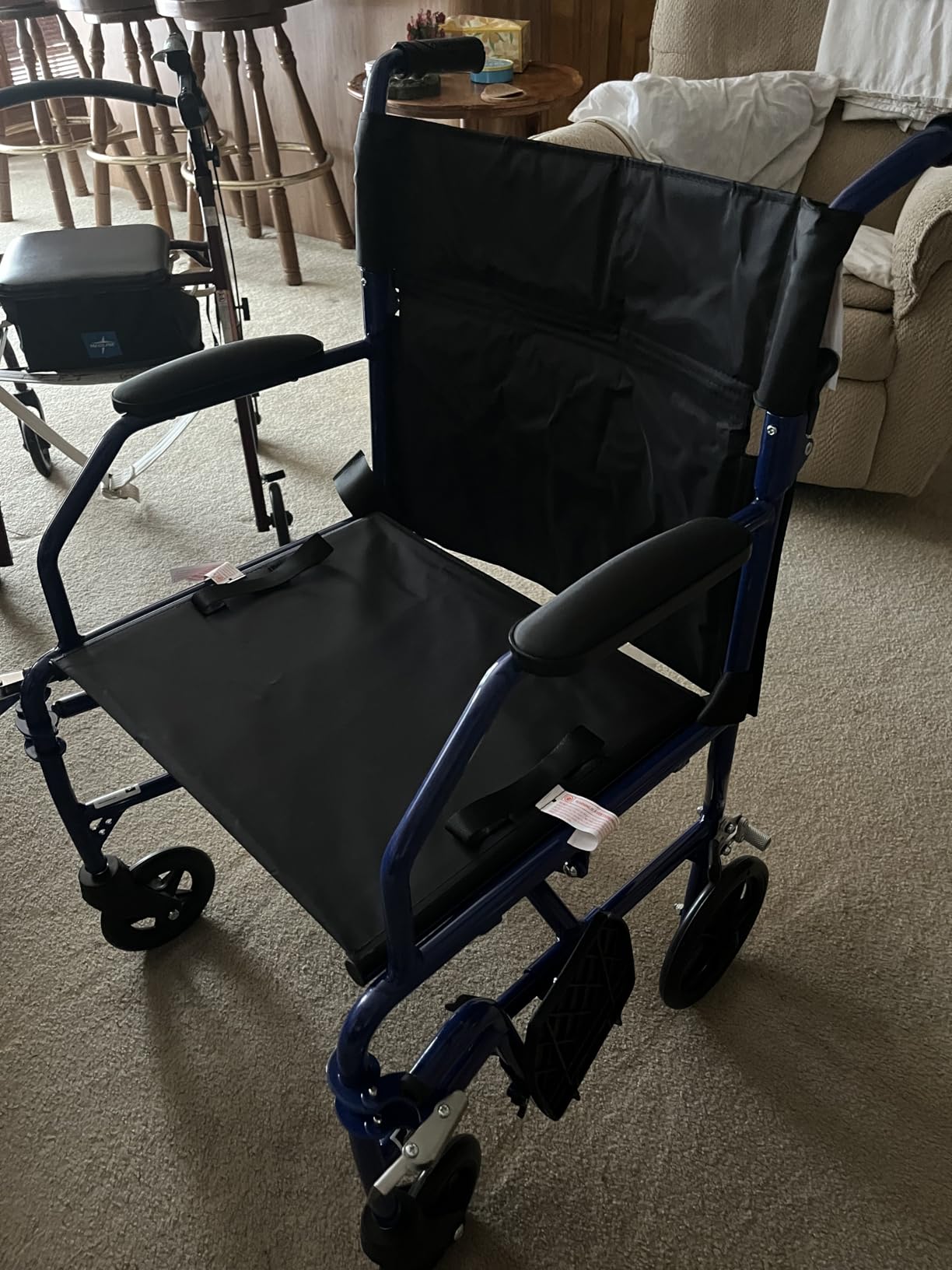 Medline Ultra Lightweight Transport Wheelchair for Adults, Foldable, 19-Inch Seat Width, Red Frame, Black Upholstery customer photo 2