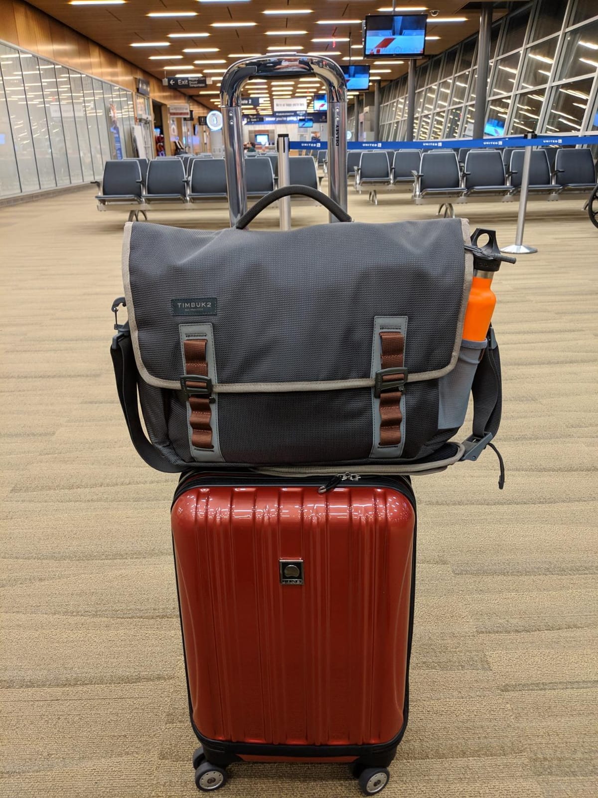 DELSEY PARIS Helium Aero Hardside Expandable Luggage with Spinner Wheels, Brick Red, Checked-Medium 24 Inch customer photo 1