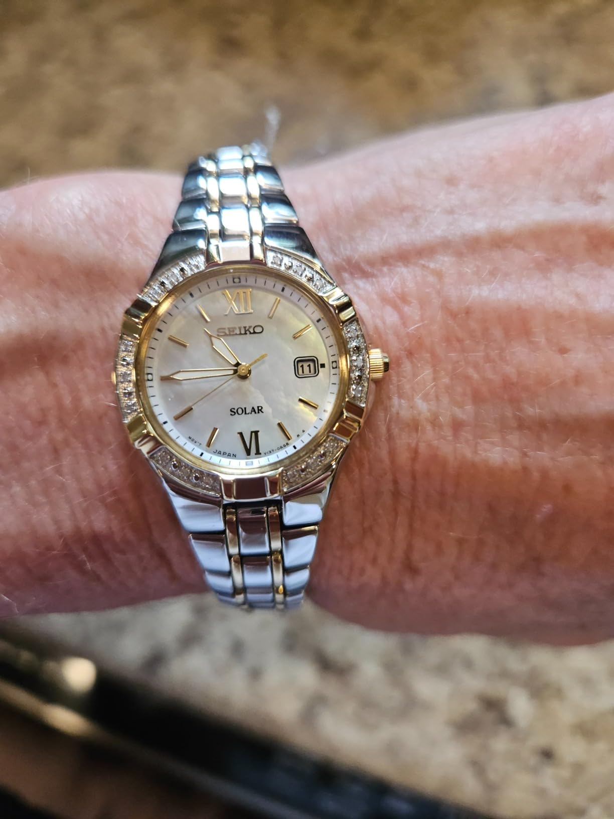 SEIKO SUT068 Watch for Women - Diamond Collection - with 18 Diamond Accents, Solar Power, Mother-of-Pearl Dial, Two-Tone Gold Stainless Steel Case & Bracelet, and Water-Resistant to 50m customer photo 2