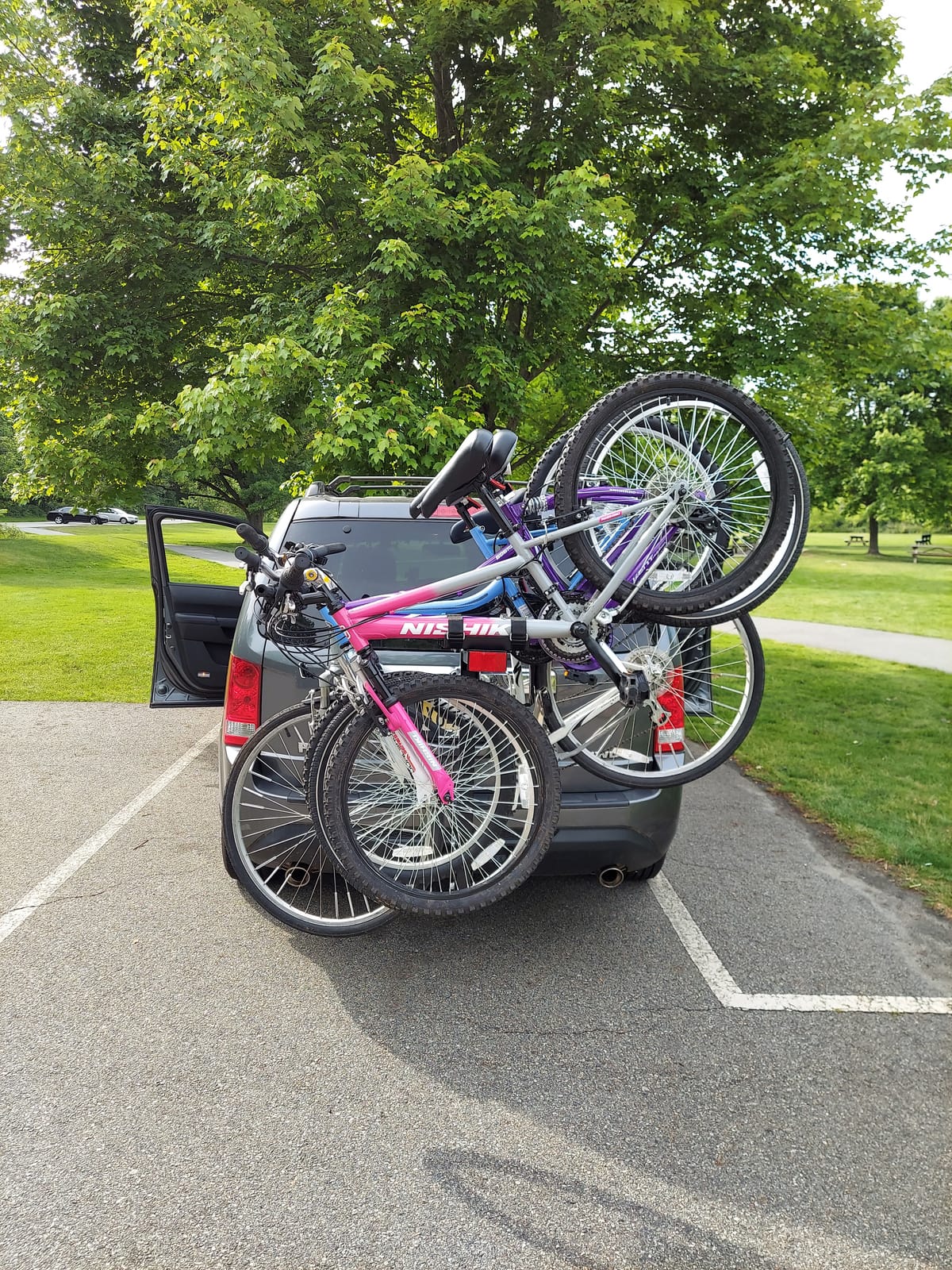 MaxxHaul Hitch Mount 4 Bike Rack 150 lb Capacity Heavy‑Duty Swing Down Design Fits Cars Trucks SUVs and Minivans with Safety Reflector Easy Install (70210) customer photo 1