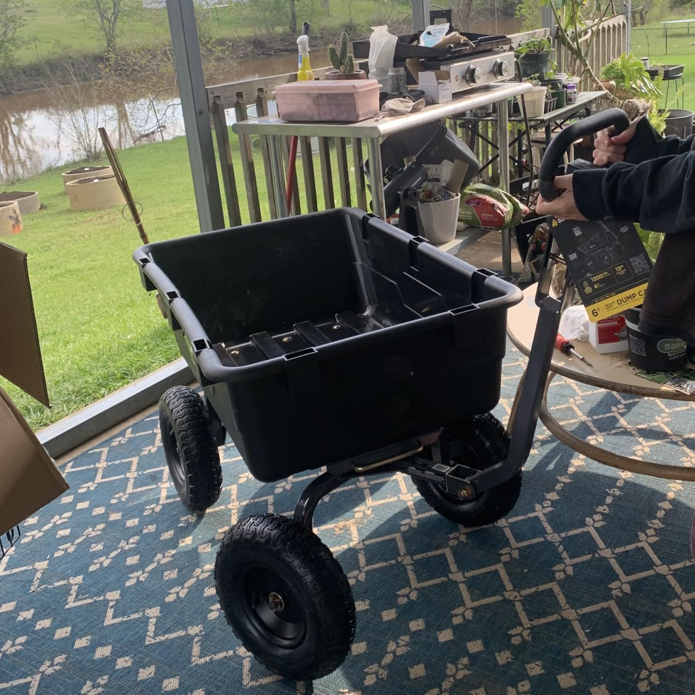 Gorilla Carts Poly Dump Cart, 600 lb. Capacity, 4 Cu ft, Quick Release Dump | Pneumatic Tires, Patented quick-release dumping, For yard, landscaping & gardening, Rust-resistant poly bed, Easy assembly customer photo 1