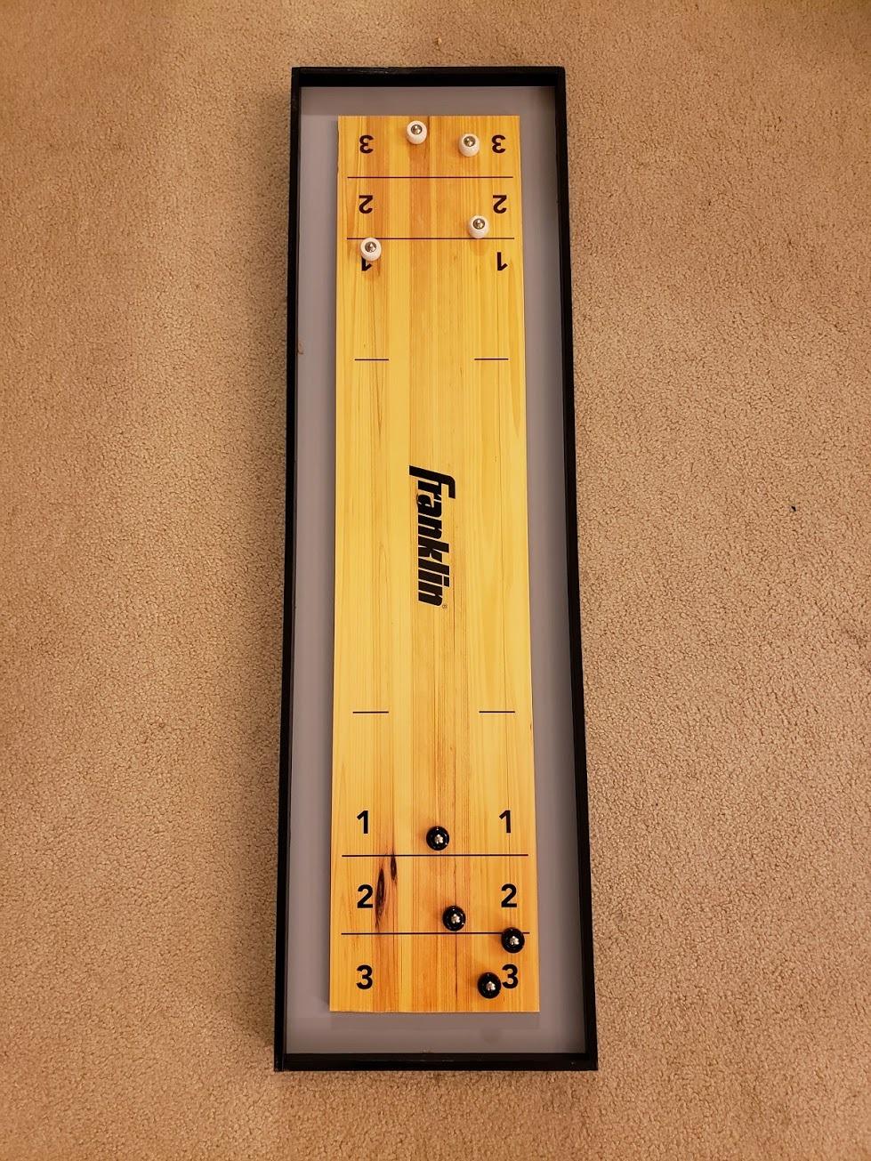 Franklin Sports 2-in-1 Shuffleboard Table and Curling Set - Portable Tabletop Set Includes 8 Rolling Mini Pucks - 45