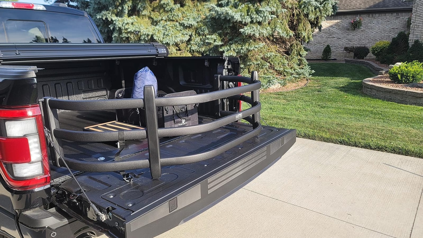 Lund-in-Motion Universal Truck BedXTender by AMP Research | 74825-01LR | Fits all Full-Size & Mid-Size Pickup Trucks customer photo 2