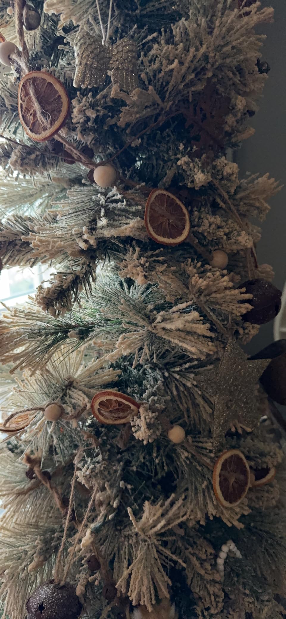 Puleo International 6.5ft Pre-Lit Flocked Portland Pine Pencil Christmas Tree with 300 Clear Lights, 410 Realistic Dense Snow Flocked Branch Tips, Easy Setup Artificial Trees with Sturdy Metal Stand customer photo 2