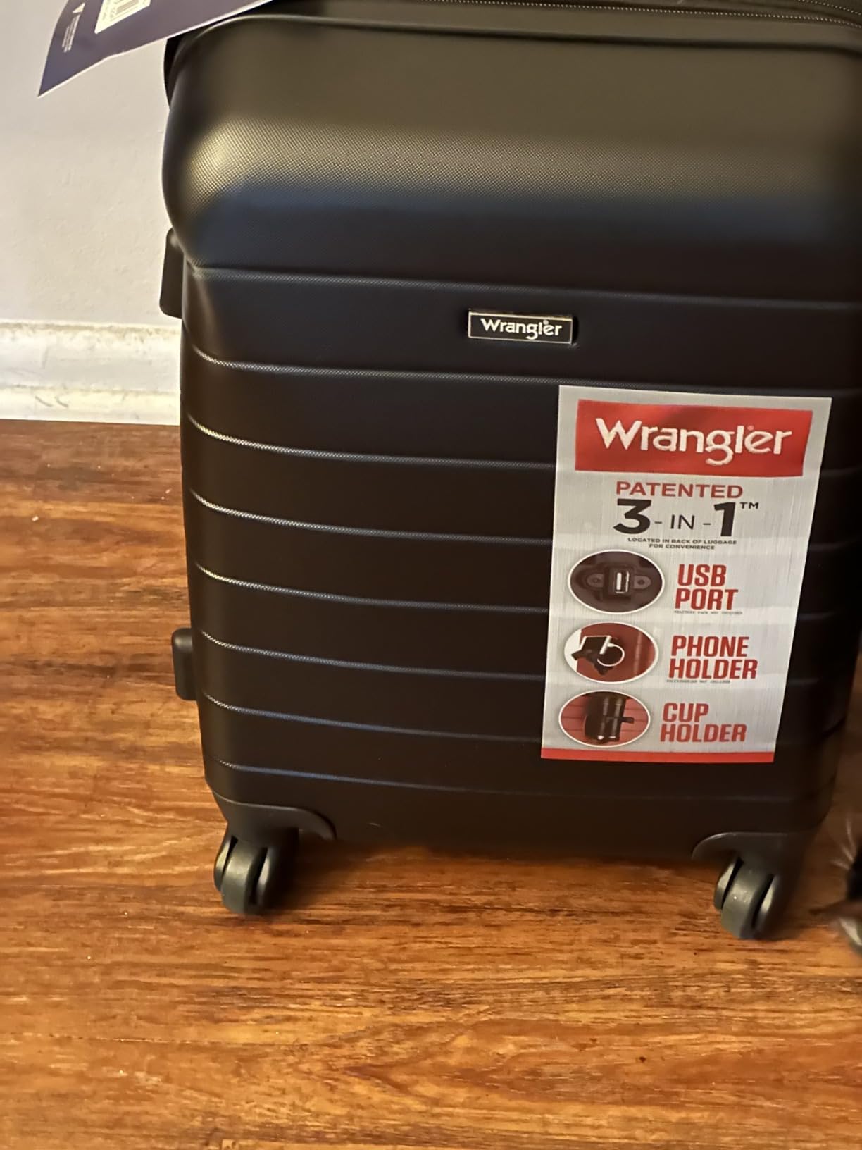 Wrangler Smart Spinner Hardside Luggage, 22-Inch Carry-On, Navy Blue customer photo 1