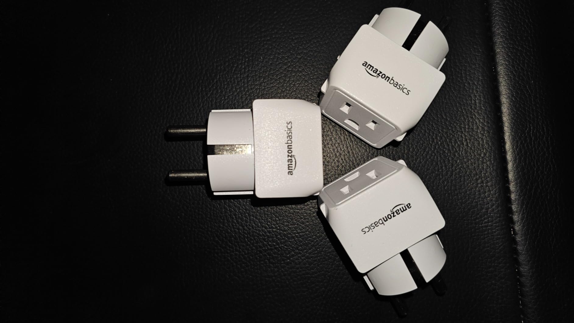 Amazon Basics 3-Pack Travel Plug Adapter Type E/F, US to Europe, Power Adapter for France, Germany, Greece, Hungary, Iceland, Netherlands, Norway, Poland, Portugal, Romania, Spain, White customer photo 2