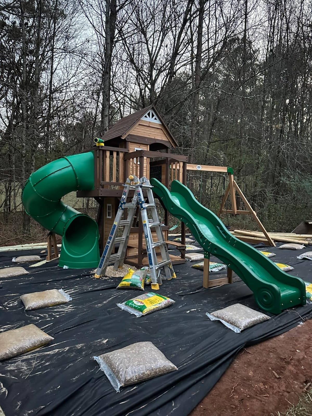 Backyard Discovery Cedar Cove Cedar Wood Swing Set with Spiral Tube Slide, Wave Slide, Clubhouse, Toy Grill, Snack Bar, Rock Wall, Belt Swings, Web Swing, Balcony, Chalkboard, Ladder, Outdoor Playset customer photo 1