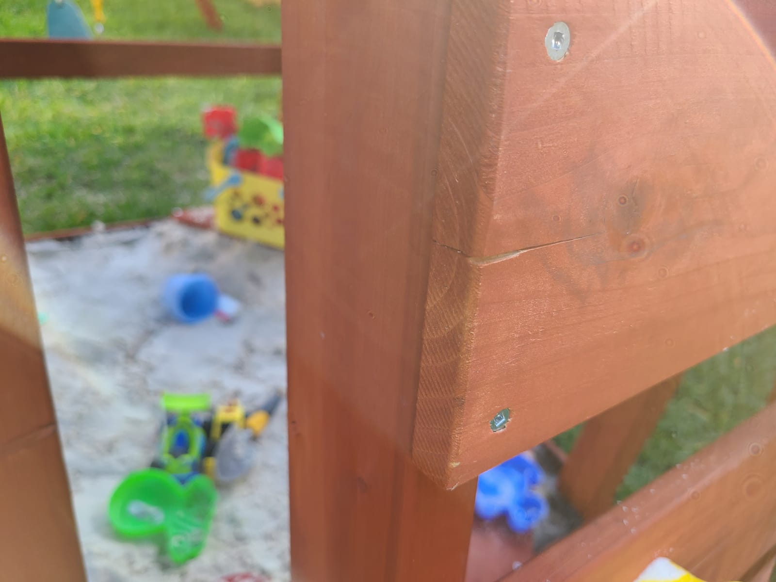 Gorilla Playsets Playmaker Deluxe Wooden Swing Set with Vinyl Canopy Roof, Dual Wave Slides, and Rock Climbing Wall, Redwood Stained Cedar customer photo 1