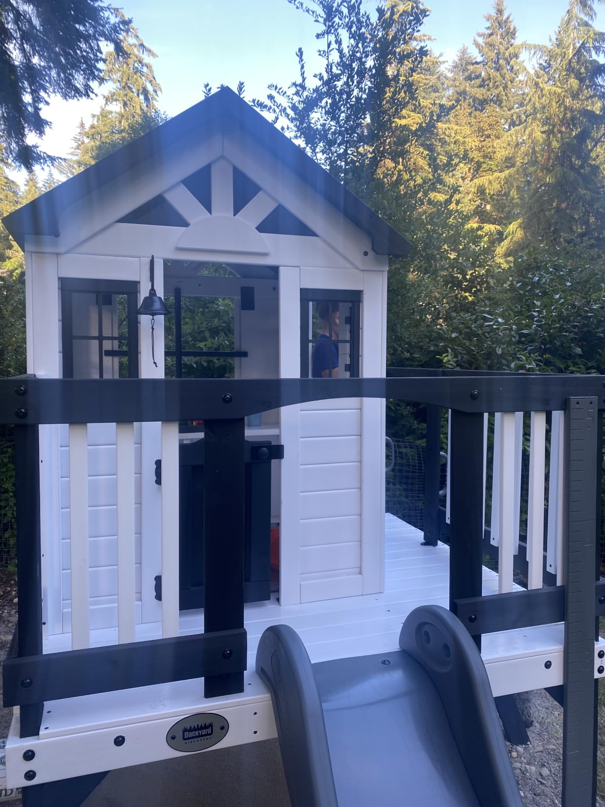 Backyard Discovery Echo Heights Elevated Cedar Wooden Kids Playhouse with Wave Slide, Play Kitchen, Wrap-Around Deck, Flat-Step Ladder, Half Door, Windows, Bell, and Growth Chart for Outdoor Play customer photo 2