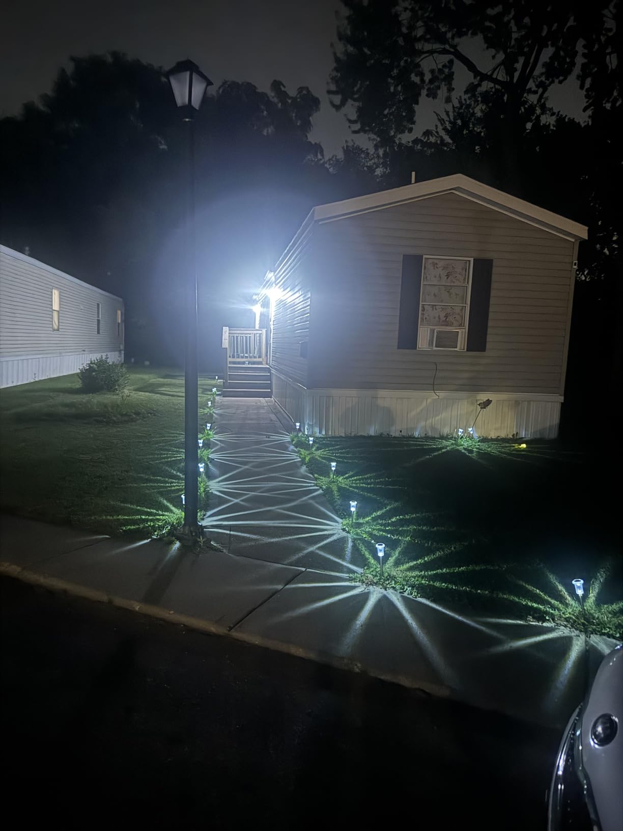 Eyrosa Solar Outdoor Lights, 10 Pack Waterproof Stainless Steel Solar Stake Lights for Pathway Garden Yard Path Walkway Driveway Lawn Patio Outside Decor, Cool White customer photo 1
