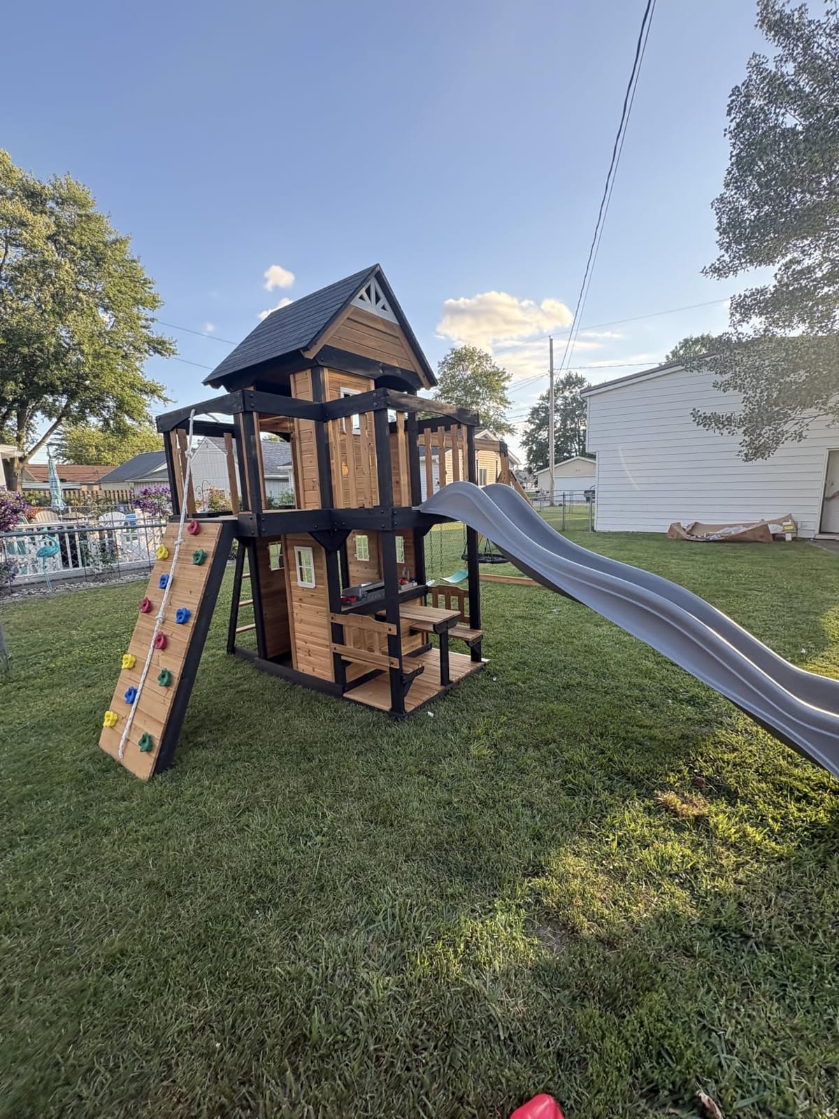 Backyard Discovery Canyon Creek Cedar Wood Swing Set with Wave Slide, Clubhouse, Play Kitchen, Picnic Area, Belt Swings, Web Swing, Rock Wall, Balconies, Playhouse, Step Ladder, Outdoor Playset customer photo 1