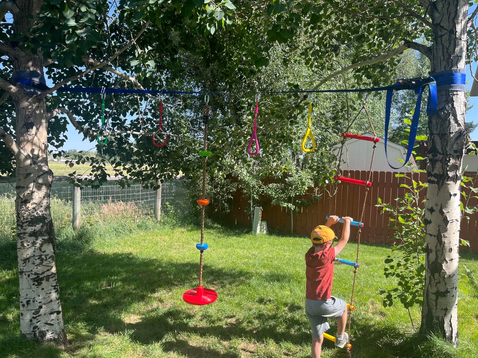 Ninja Warrior Obstacle Course for Kids Outside-Ninja Slackline 52ft with 11 Durable Obstacles-Climbing Net,Wheel, Warrior Gymnastics & Monkey Bars,Slack Lines for Backyard for Kids. customer photo 2