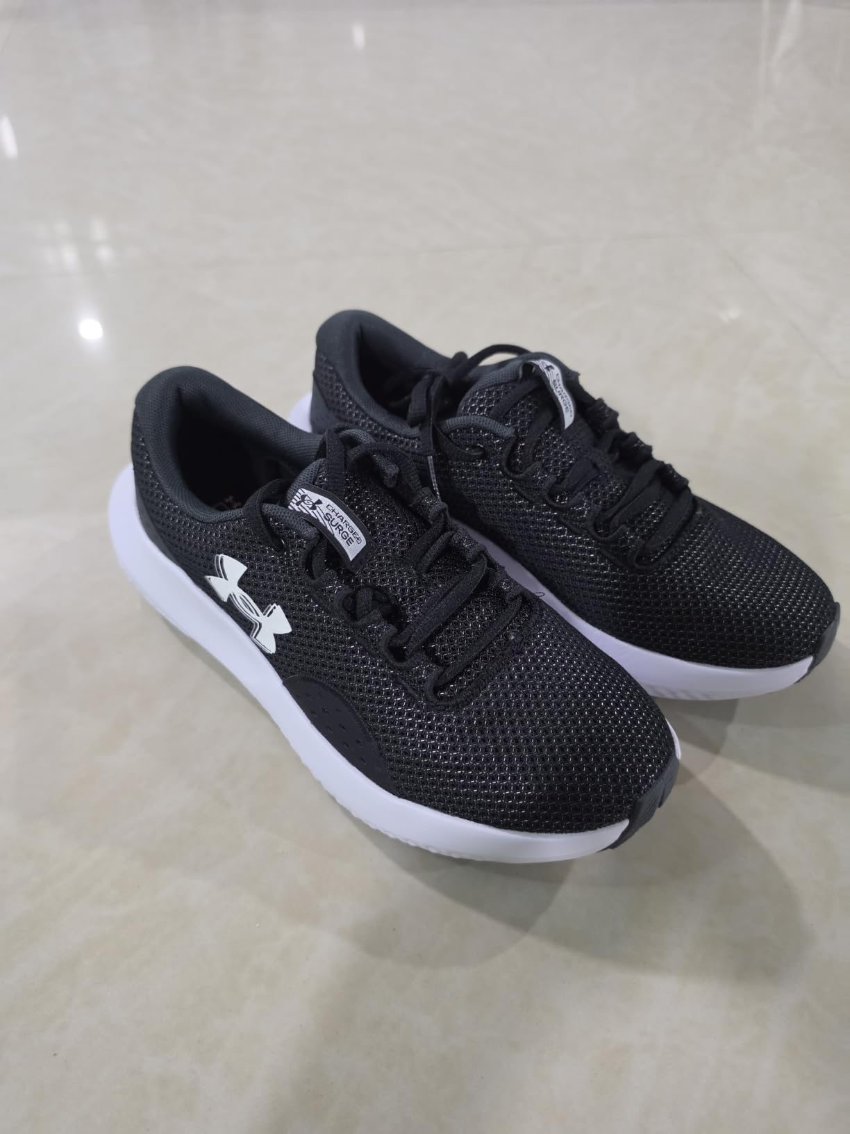 Under Armour Women's Charged Surge 4 Running Shoe customer photo 1