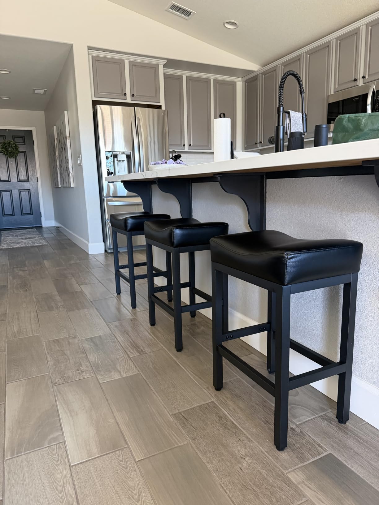 Raynesys 24 Inche Bonded Leather Counter Height Bar Stools Set of 2 Square | Barstools with Thick Bonded Leather Saddle Seats & Heavy Duty Metal Base for Kitchen Counter, Easy Assembly, All Black customer photo 1
