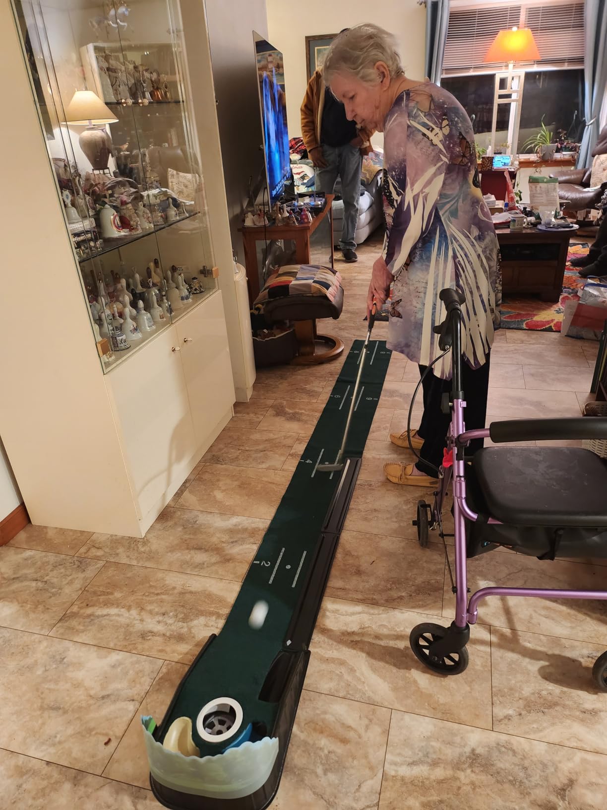 Putting Green Indoor - Golf Putting Mat boasts Genuine Green Speed and a Wrinkle-Free Surface. 8ft Practice Putting Mat with lenticular 3D Backplate, Alignment Guides and Ball Return customer photo 2