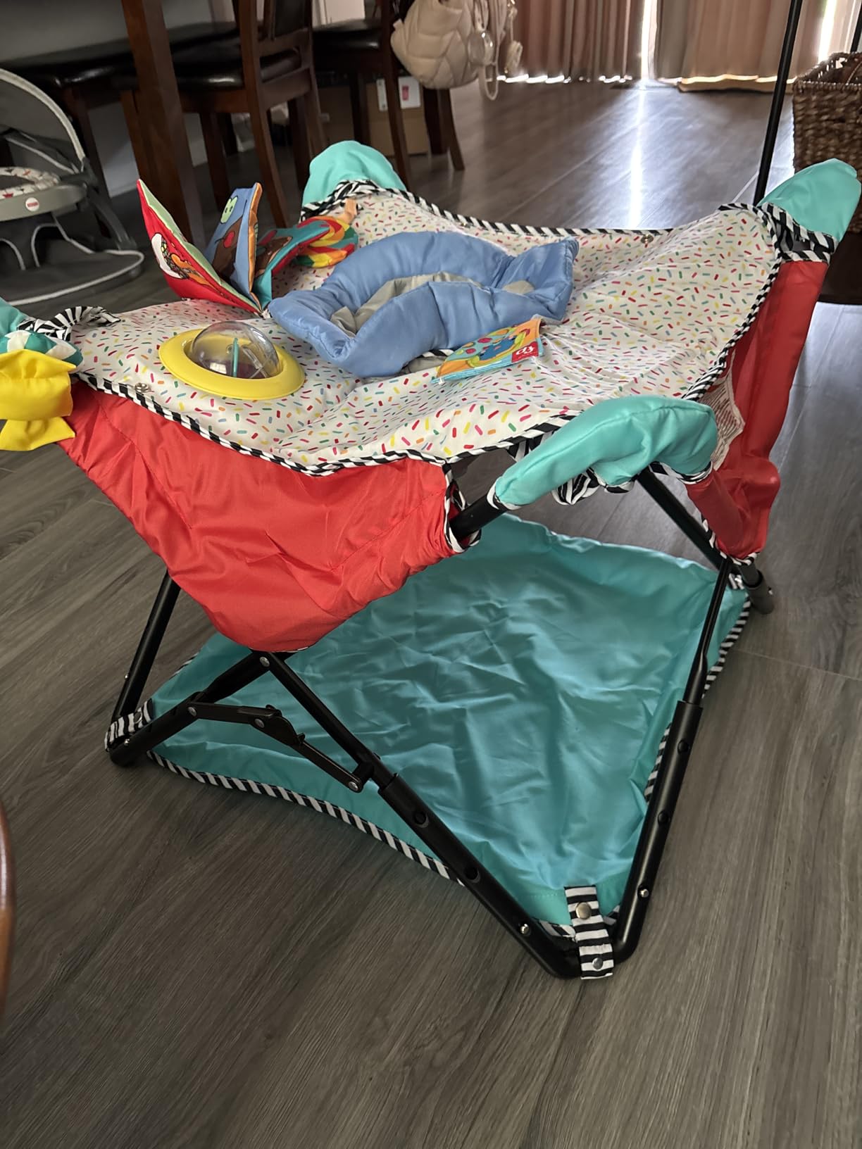 Bright Starts Pop 'N Jump Portable Baby Jumper, Foldable Indoor/Outdoor Baby Jumper with Sweet Treats with Sensory Activities, Ages 6–12 Months customer photo 1