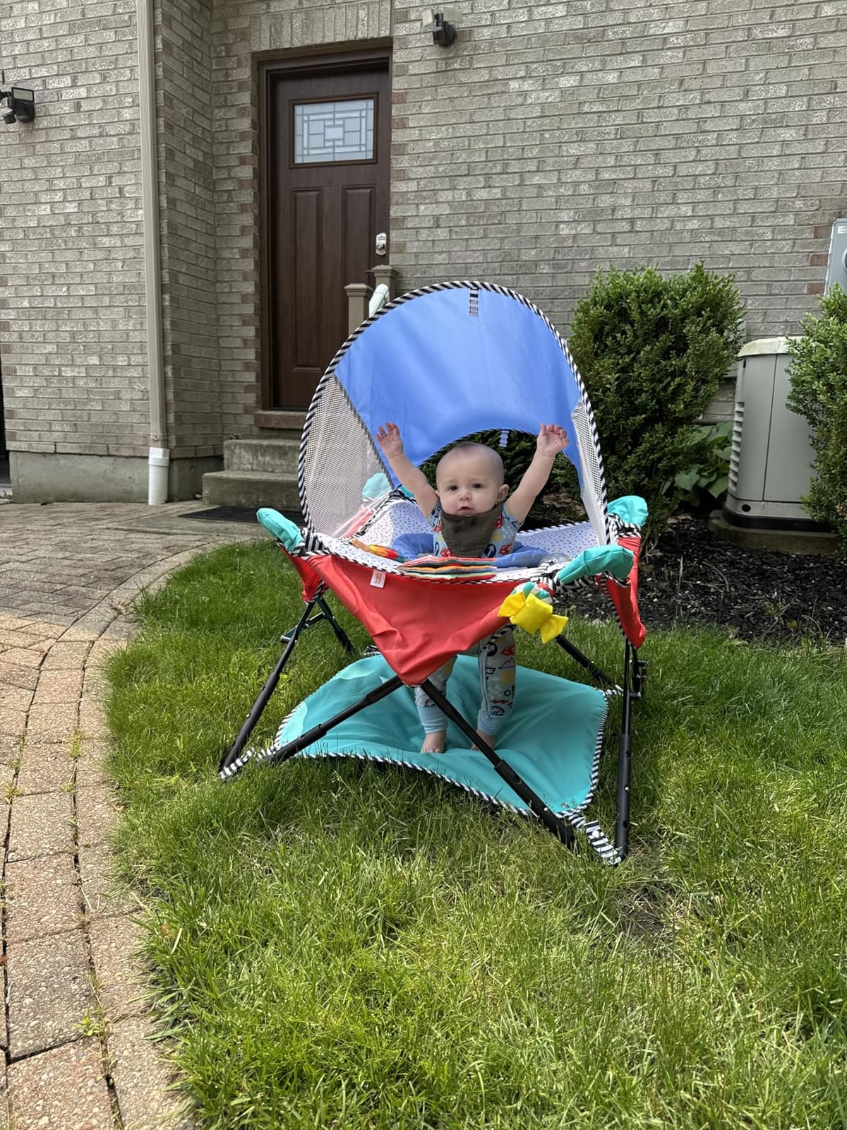 Bright Starts Pop 'N Jump Portable Baby Jumper, Foldable Indoor/Outdoor Baby Jumper with Sweet Treats with Sensory Activities, Ages 6–12 Months customer photo 2