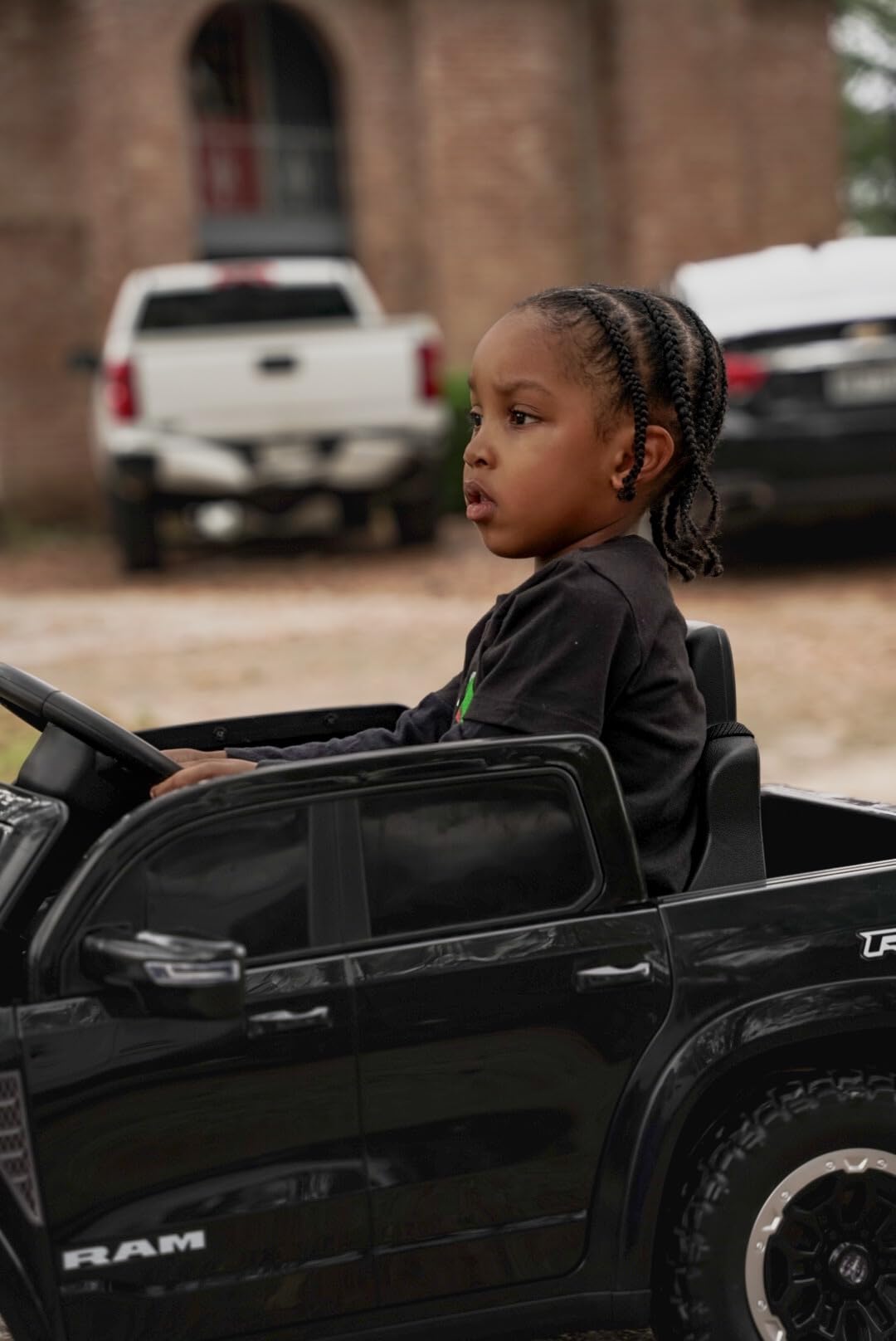 First Ride On 12V Licensed Ram 1500 Ride on Toy for Kids, Toddler Ride on Pickup Truck with Parent Remote Control, Electric Car for Kids with Truck Bed Storage, 3 Point Safety Belt (Black) customer photo 2