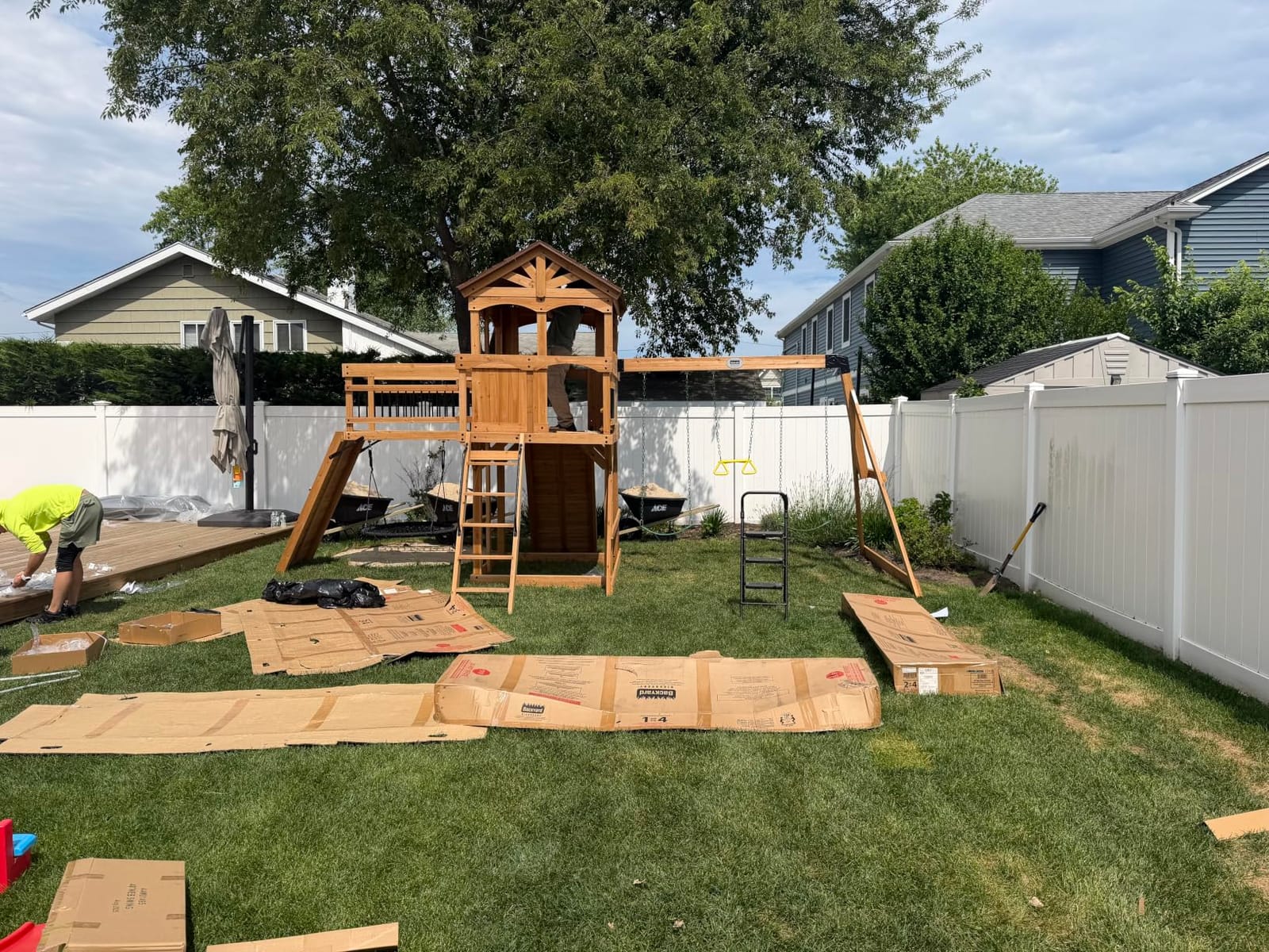 Backyard Discovery Dover Bay Spruce Wood Swing Set with Spiral Tube Slide, Wave Slide, Clubhouse, Rock Wall, Belt Swings, Step Ladder, Toy Telescope, Chalkboard, Outdoor Playset customer photo 2