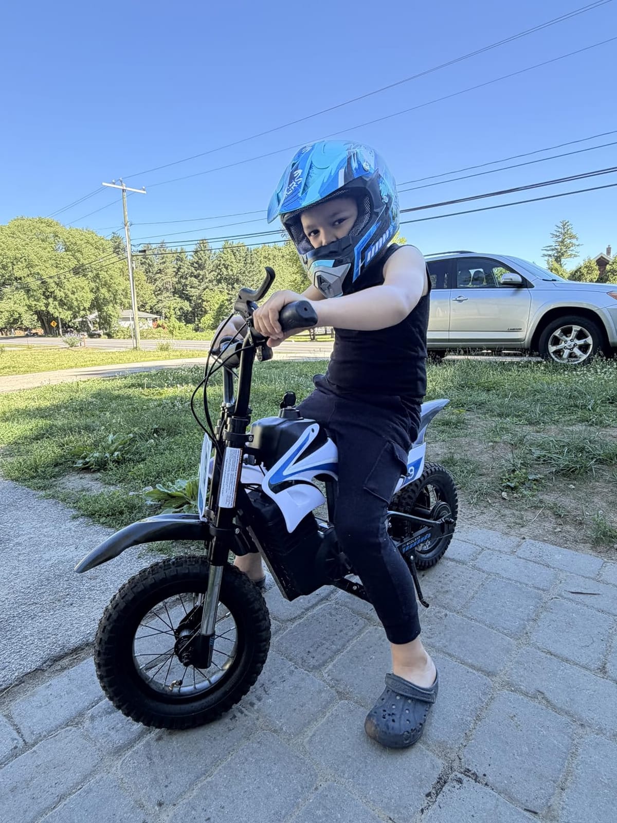 K1 Kids Electric Dirt Bike, 36V, 700W, 16 MPH, 14-Mile, Ages 3-10 (Sky Blue) customer photo 1