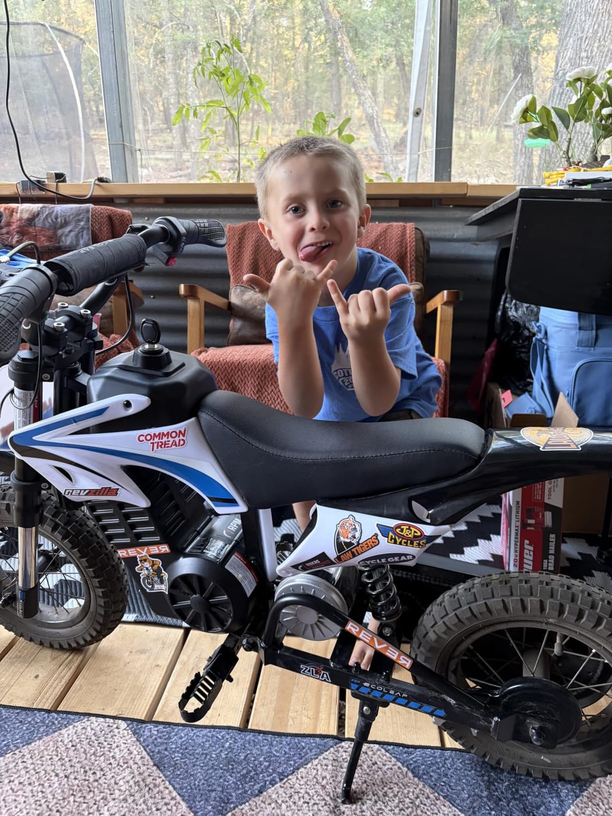 K1 Kids Electric Dirt Bike, 36V, 700W, 16 MPH, 14-Mile, Ages 3-10 (Sky Blue) customer photo 2