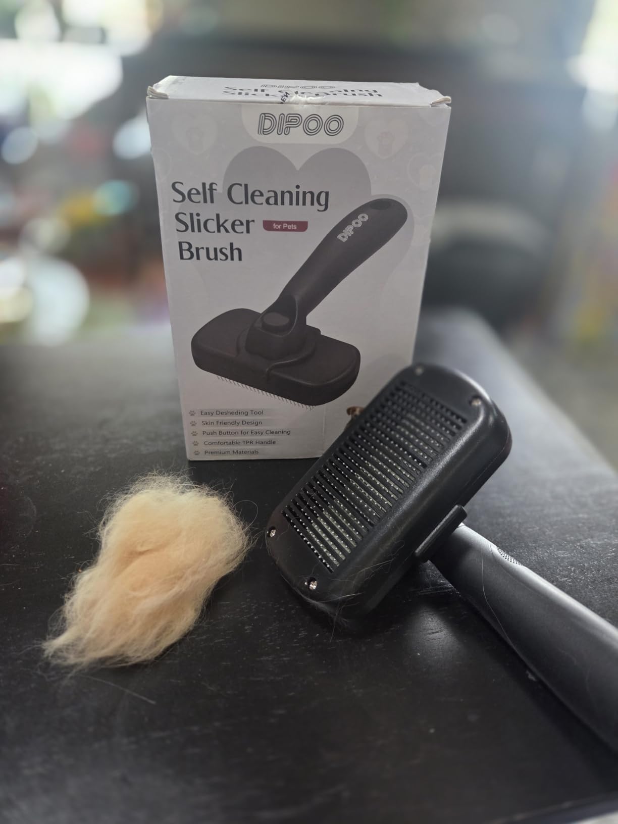 Dipoo Self Cleaning Shedding Brush - Skin Friendly Grooming Tool for Dogs, Cats, and Puppies, Deshedding and Hair Removal for Long and Short Haired Pets, Black customer photo 1