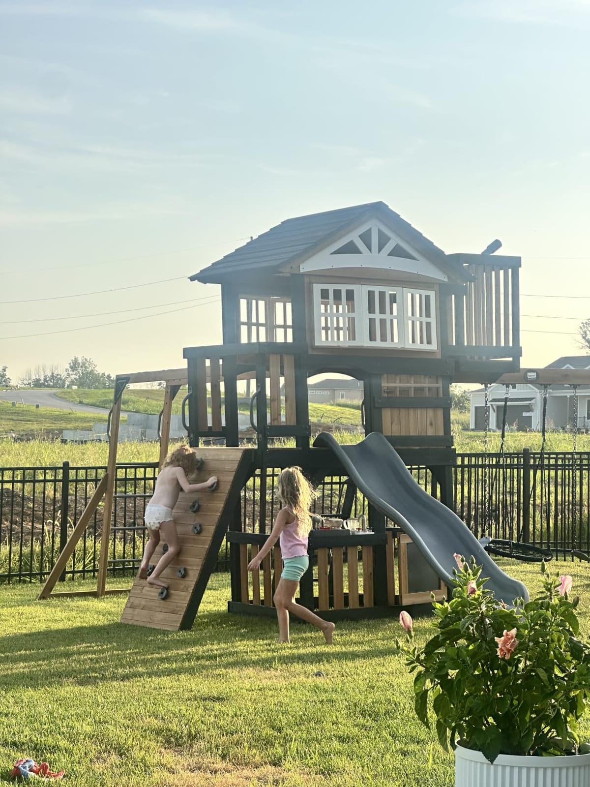 Backyard Discovery Rosewood Falls Cedar Wood Swing Set with Monkey Bars, Clubhouse, Crow's Nest, Play Kitchen, Wave Slide, Rock Wall, Belt Swings, Web Swing, Half Door, Chalkboard, Outdoor Playset customer photo 1